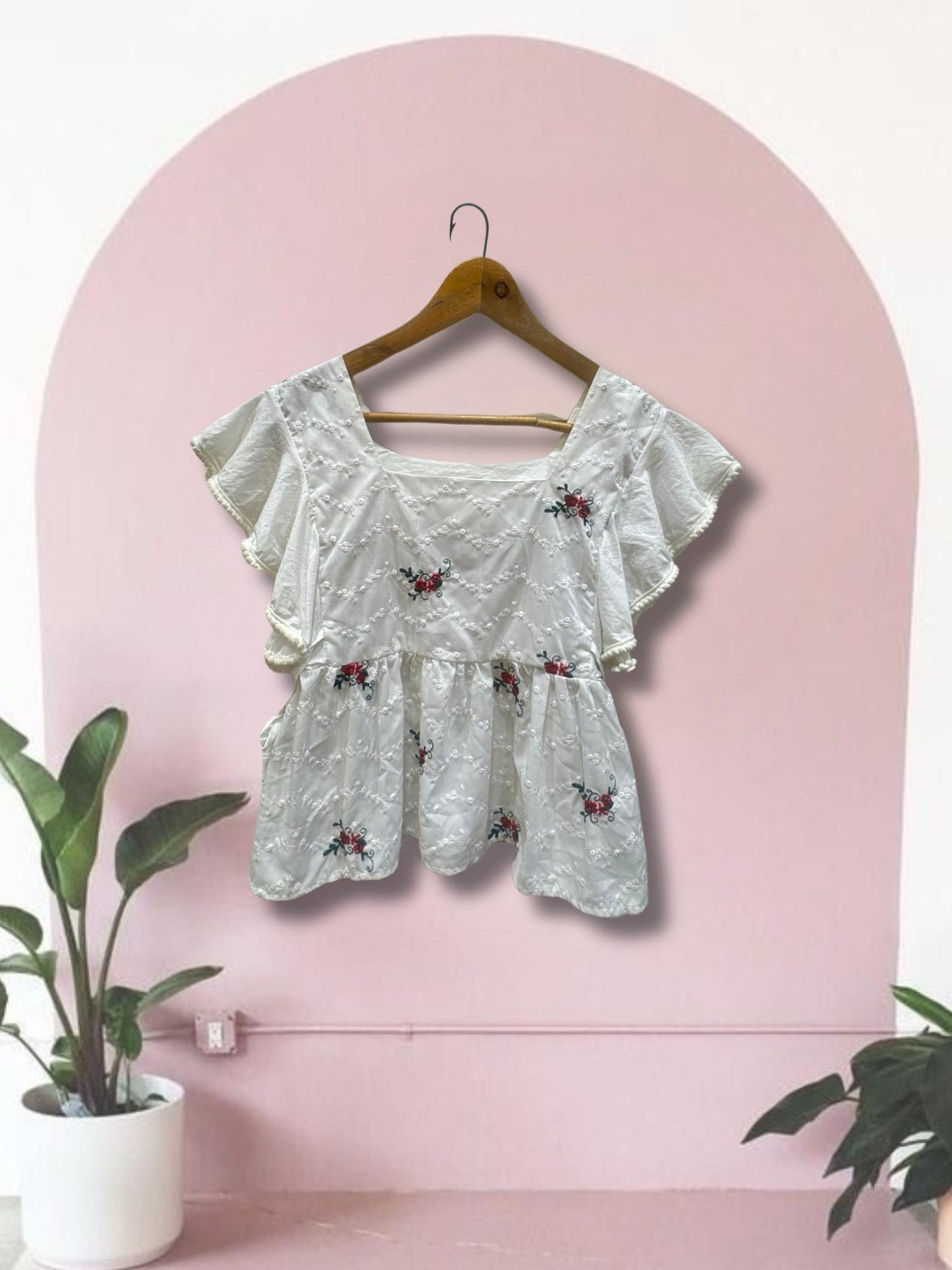 Embroidered Peplum Top