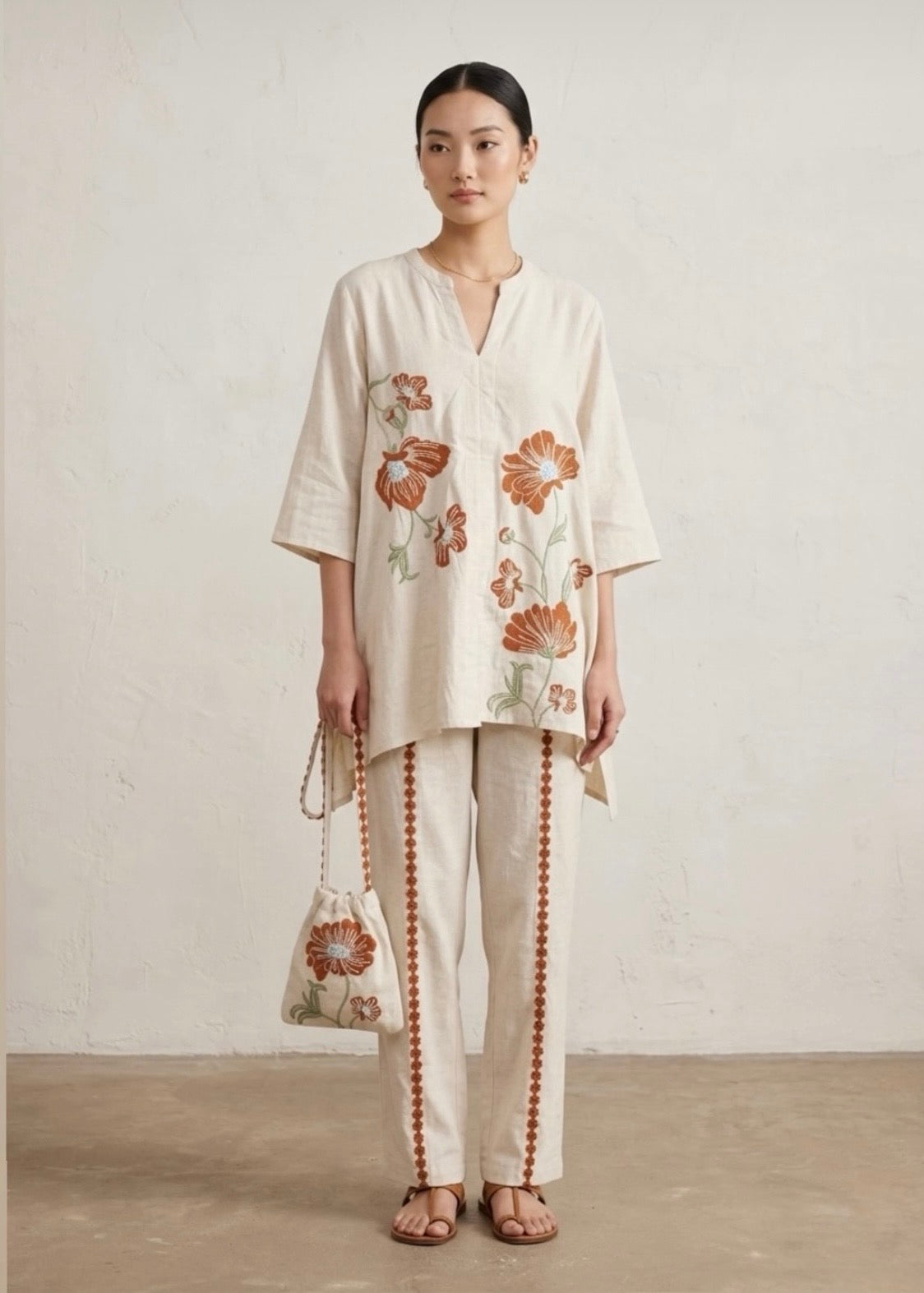 Beige Floral Embroidered Tunic & Pant Set.
