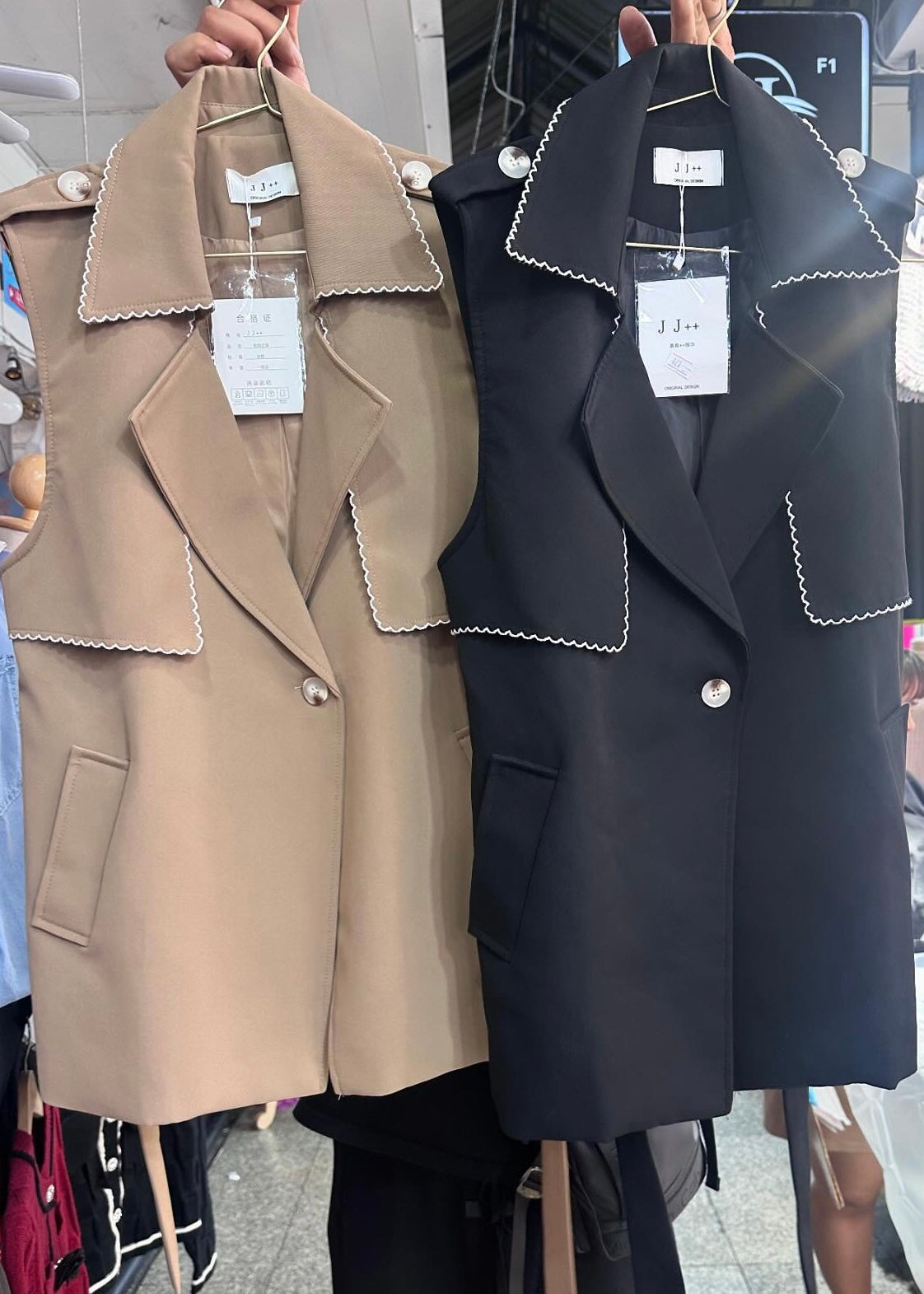 Sleeveless Mid Length Coat